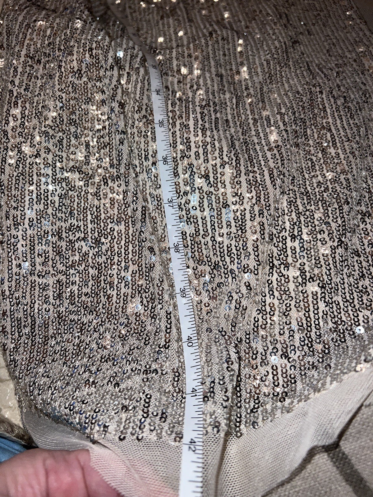7754034