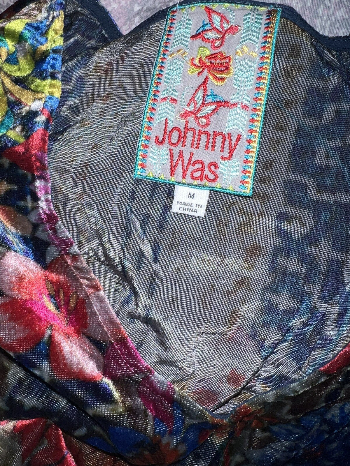7880003