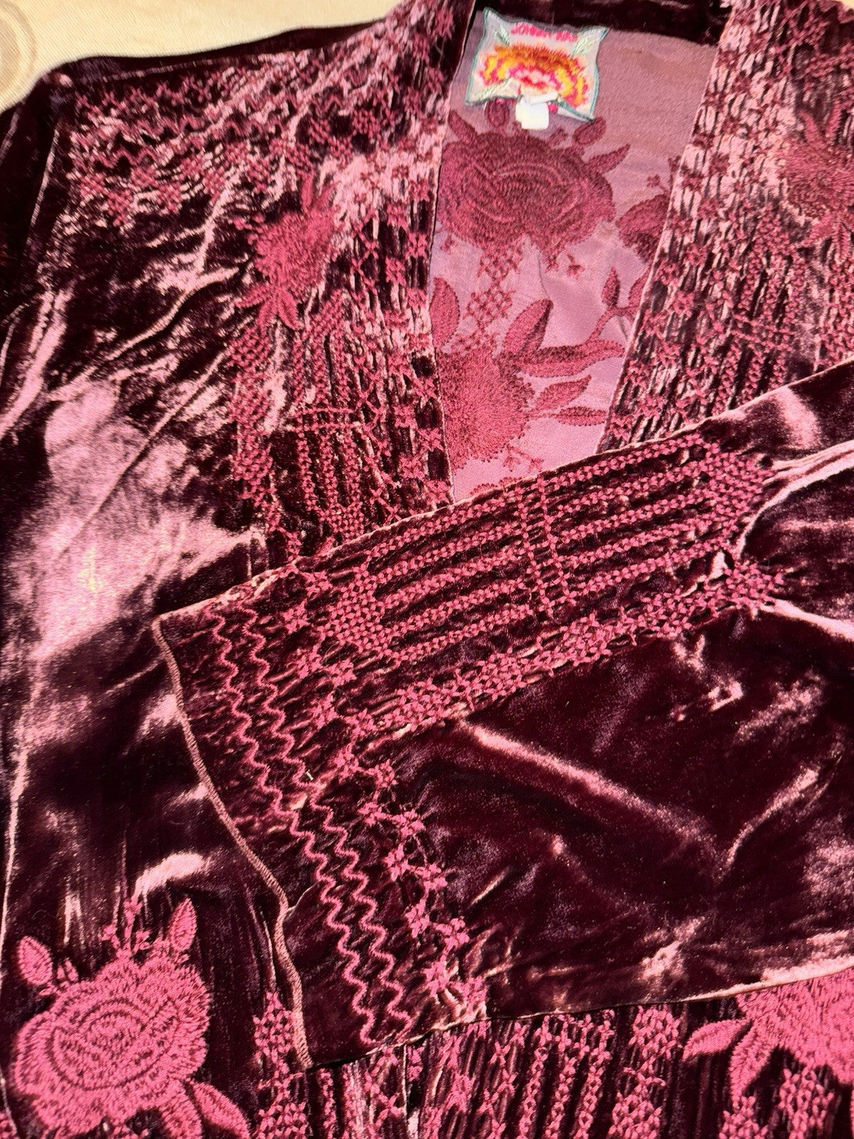 7615719
