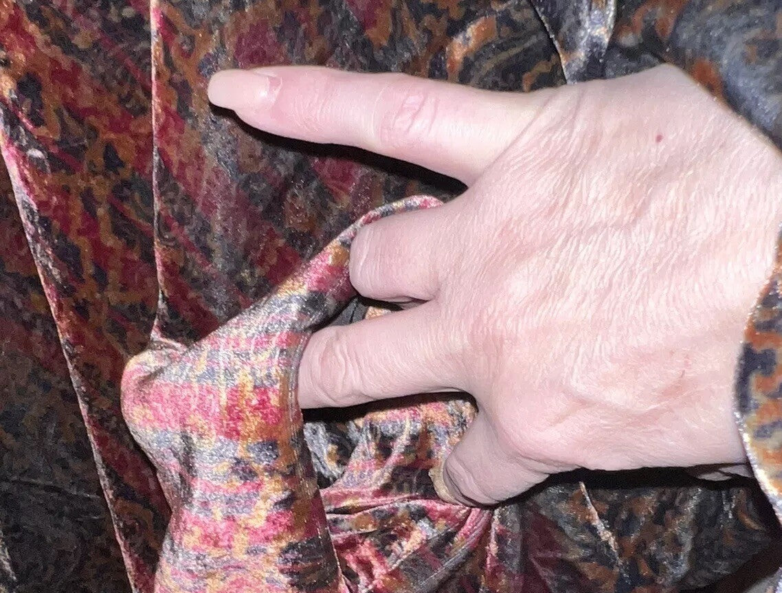 7977128