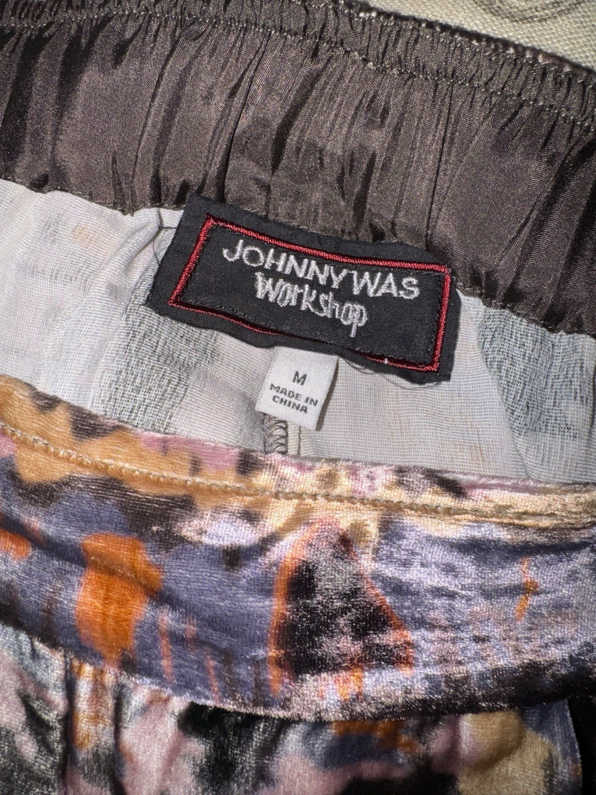 7699061