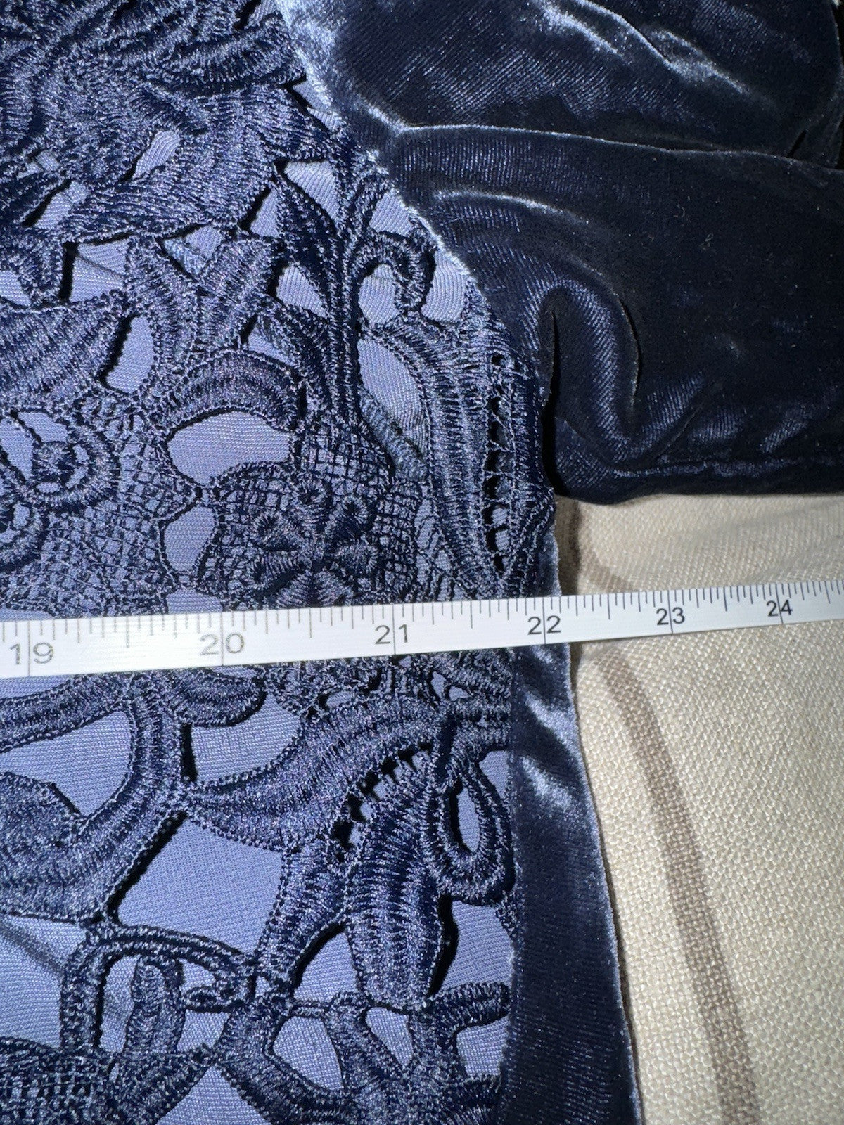 7652823