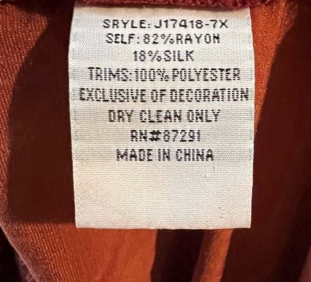 6955915
