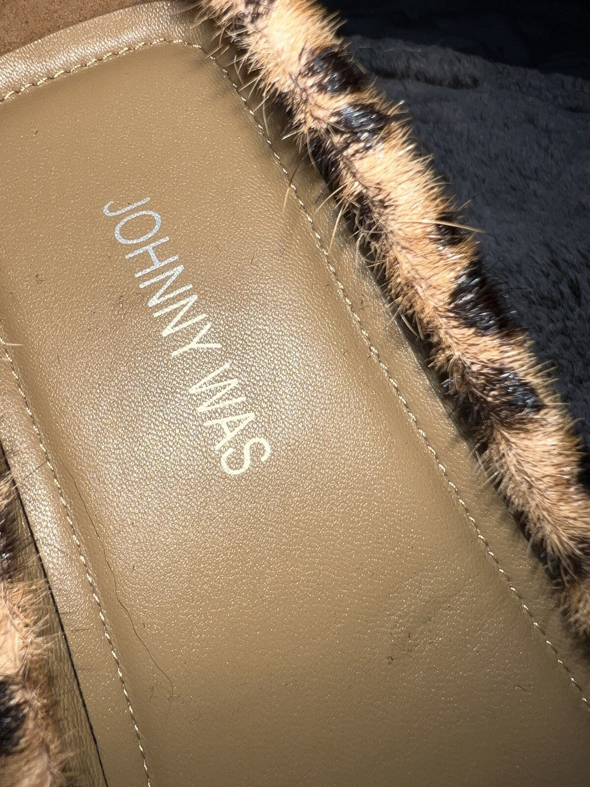 7993890